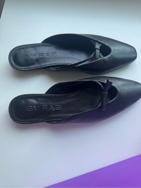 BY FAR Black Leather Pointed Slip-On Mules with Knotted Accent